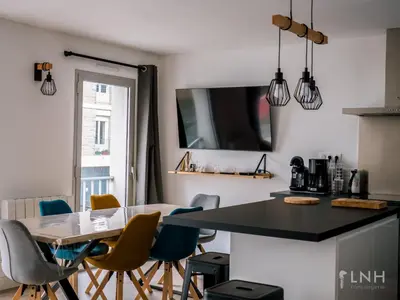 Télévision ou salle de divertissement dans l'établissement L'appartement de jeanne