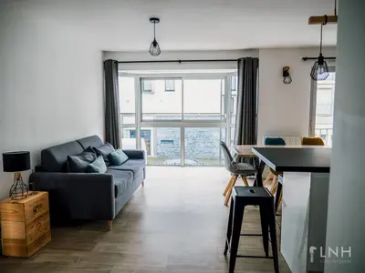 Coin salon dans l'établissement L'appartement de jeanne
