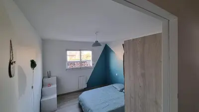 Un ou plusieurs lits dans un hébergement de l'établissement Maison 3 chambres vue mer et phare