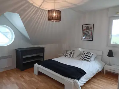 Un ou plusieurs lits dans un hébergement de l'établissement La maison des vacances