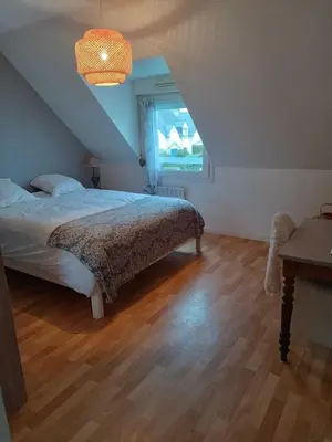 Un ou plusieurs lits dans un hébergement de l'établissement La maison des vacances