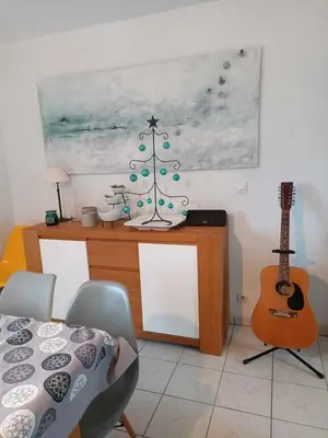 Coin salon dans l'établissement La maison des vacances