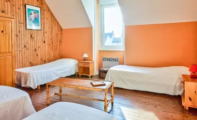 Un ou plusieurs lits dans un hébergement de l'établissement À 100m de la plage ! Maison pour 6 à Penmarch