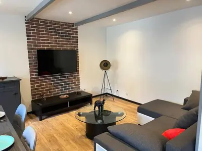 Télévision ou salle de divertissement dans l'établissement 36 avenue de la gare