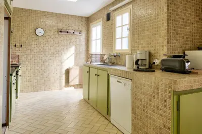 Cuisine ou kitchenette dans l'établissement Vacances en famille ou entre amis à Loctudy