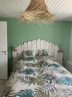 Un ou plusieurs lits dans un hébergement de l'établissement Chambre d’hôtes coconing