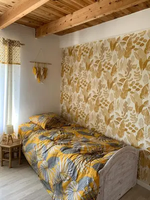 Un ou plusieurs lits dans un hébergement de l'établissement Chambre d’hôtes coconing