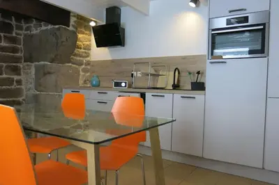 Cuisine ou kitchenette dans l'établissement Les Crins de Gaïa