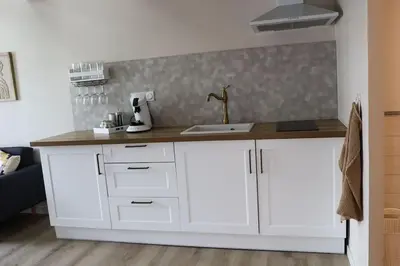 Cuisine ou kitchenette dans l'établissement Ti Gwaskell, maison proche de Quimper