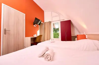 Un ou plusieurs lits dans un hébergement de l'établissement Villages Clubs du Soleil - BEG MEIL