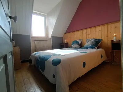 Un ou plusieurs lits dans un hébergement de l'établissement Appartement avec vue sur mer