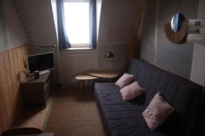 Télévision ou salle de divertissement dans l'établissement Appartement avec vue sur mer