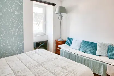 Un ou plusieurs lits dans un hébergement de l'établissement Maison classée 4 étoiles pour 6 au coeur du Guilvinec
