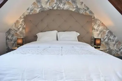 Un ou plusieurs lits dans un hébergement de l'établissement Blaz an Holen - Maison avec jardin à Guimaëc