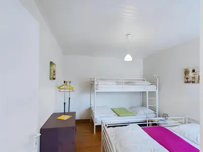 Un ou plusieurs lits dans un hébergement de l'établissement Maison pour 5 - 100m de la plage