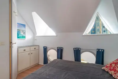 Un ou plusieurs lits dans un hébergement de l'établissement Plein Sud - Piscine partagée