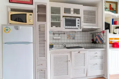 Cuisine ou kitchenette dans l'établissement Plein Sud - Piscine partagée