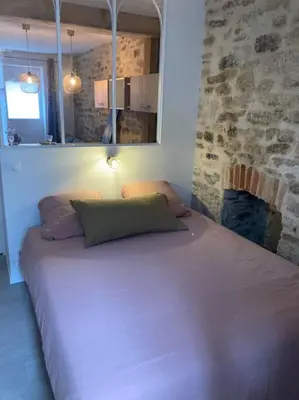 Un ou plusieurs lits dans un hébergement de l'établissement Appartement centre ville Quimper avec terrasse