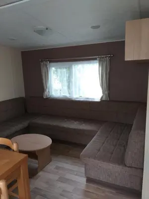 Coin salon dans l'établissement KERLANN****MOBIL-HOME 4 CH TOUT CONFORT