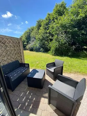 Jardin de l'établissement Joli T2 Résidence du Golf avec terrasse