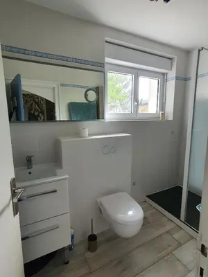Salle de bains dans l'établissement Ty Frimousse