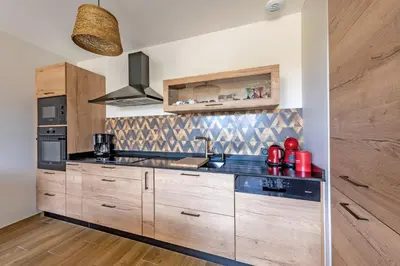 Cuisine ou kitchenette dans l'établissement Ty Gard Thalvis